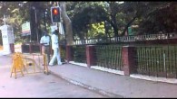 A Traffic Policemen at the entrance of anna university, adyar, chennai getting a corrpuption of Rs.50 from a call taxi driver, caught on mobile from inside the taxi    